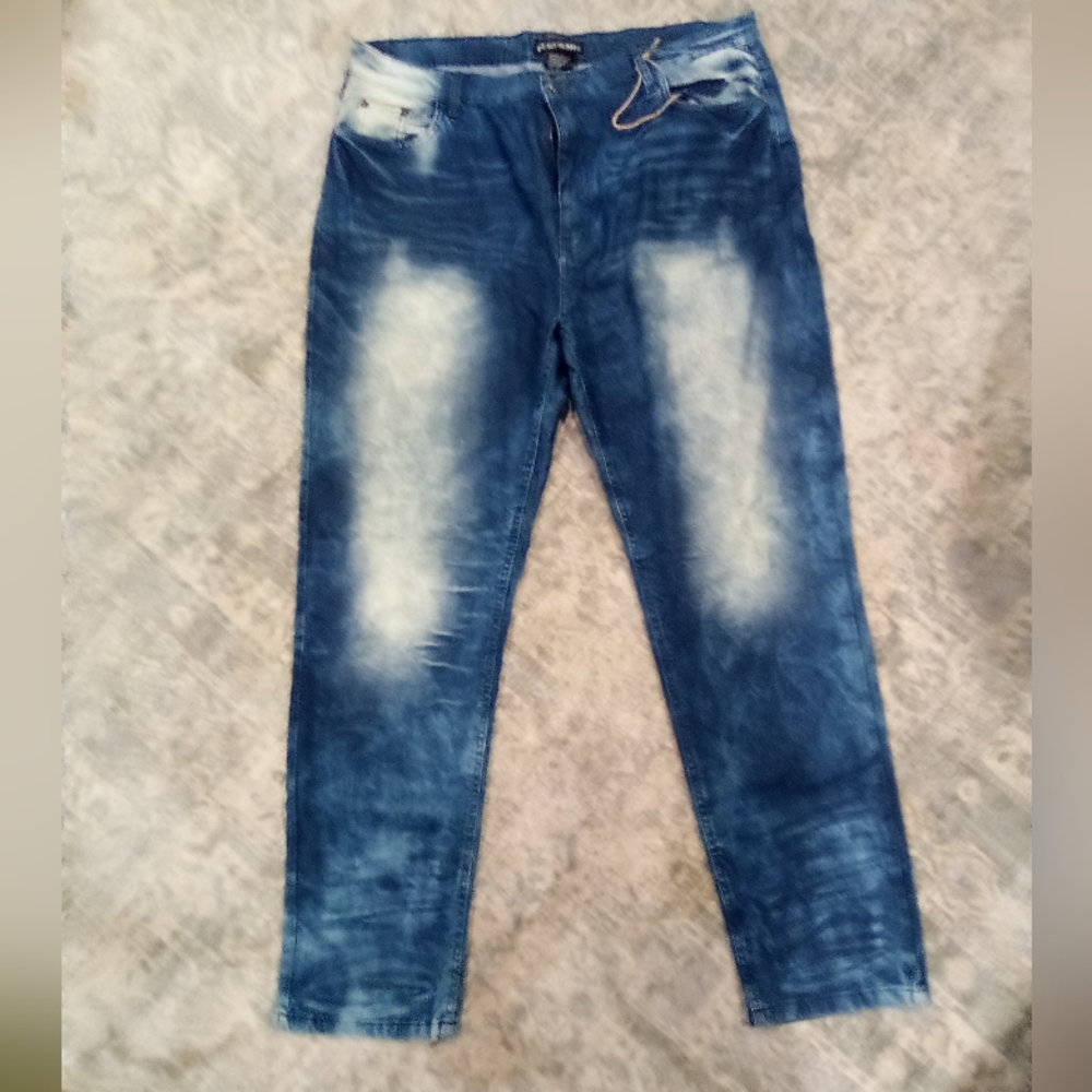 Distressed denim jeans